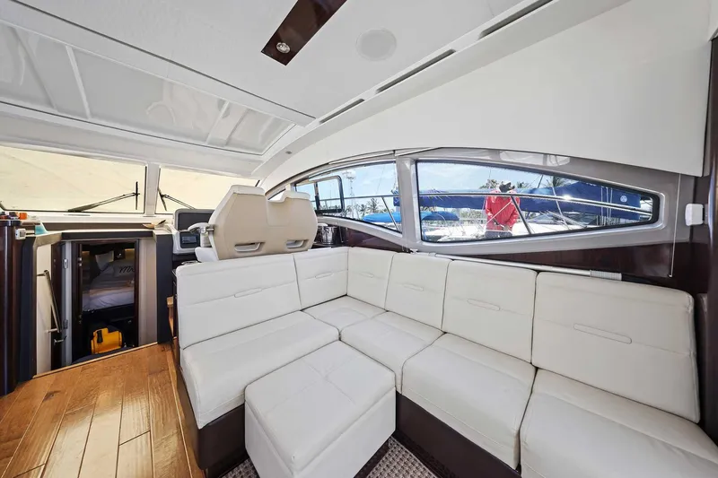Slide: The Image of Luxurious interior of 2017 Sea Ray Sundancer 400 yacht with white leather seating. - 8