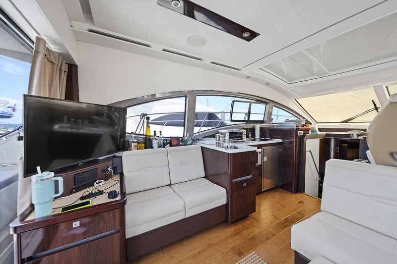 Slide: The Image of Luxurious interior of 2017 Sea Ray Sundancer 400 yacht with modern amenities and elegant design. - 9