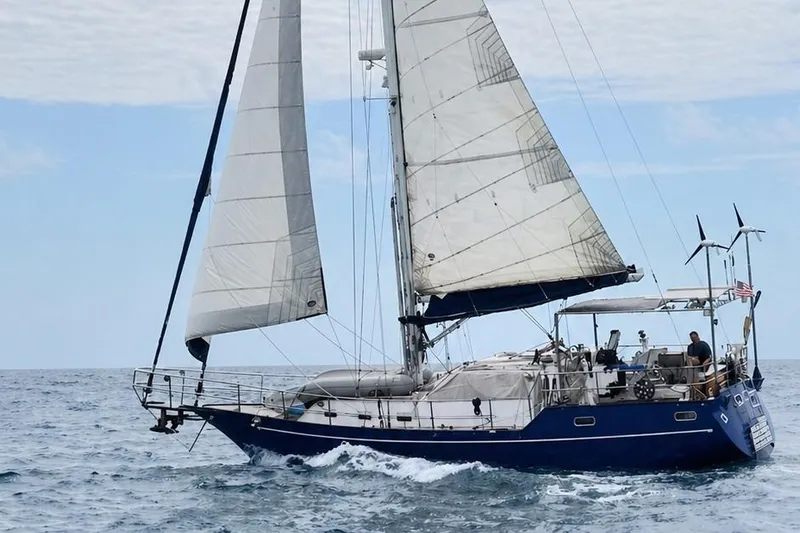 The Image of Sailing yacht "Bruce Roberts" 2000 model cruising on open sea with full sails. - 1