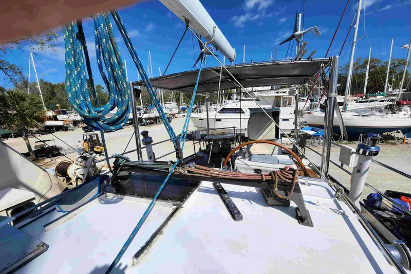 Slide: The Image of Sailboat deck view with ropes and steering wheel, Bruce Roberts model, 2000. - 20