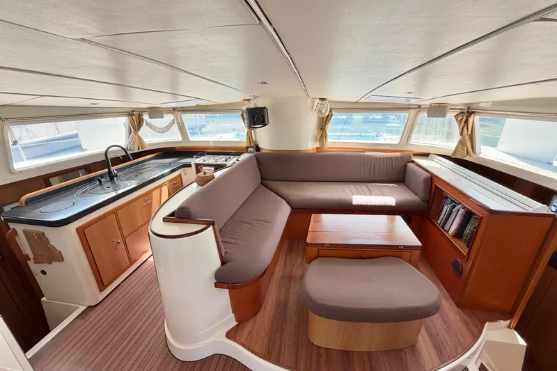 Slide: The Image of Luxurious interior of 2007 Dolphin 460 yacht with kitchen and seating area. - 44