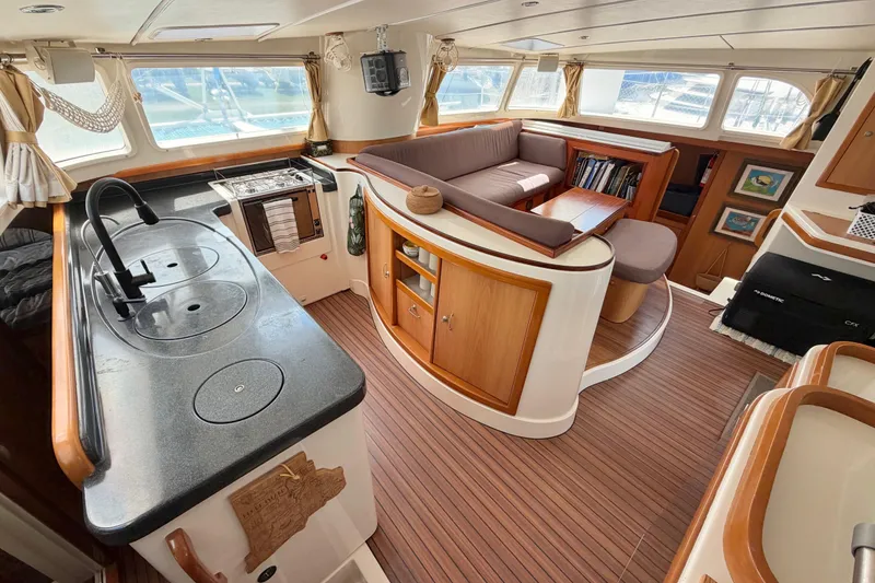 Slide: The Image of Luxurious interior of 2007 Dolphin 460 yacht with modern kitchen and cozy seating area. - 54