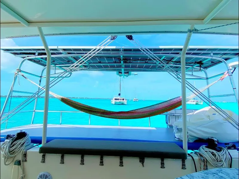 Slide: The Image of Hammock on Dolphin 460 catamaran, turquoise sea view, 2007 model. - 96