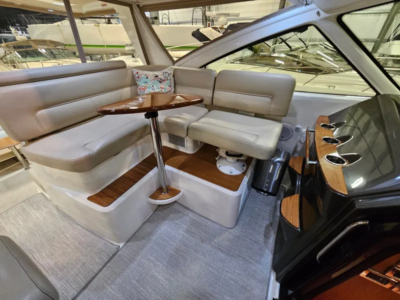 Slide: The Image of Interior of 2014 Tiara Yachts 43 Open with seating and table. - 14