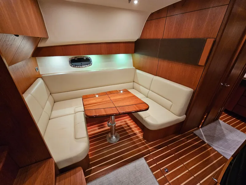 Slide: The Image of Interior of 2014 Tiara Yachts 43 Open with elegant seating area. - 17