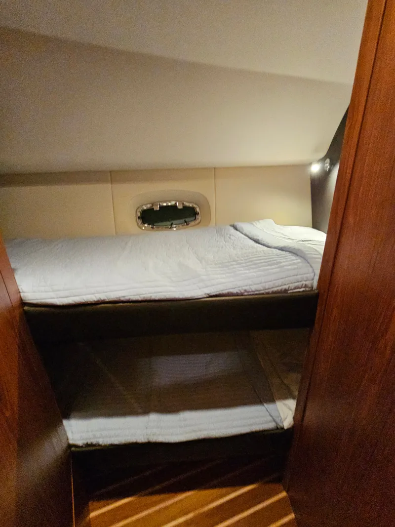 Slide: The Image of Interior of 2014 Tiara Yachts 43 Open with cozy bed. - 18