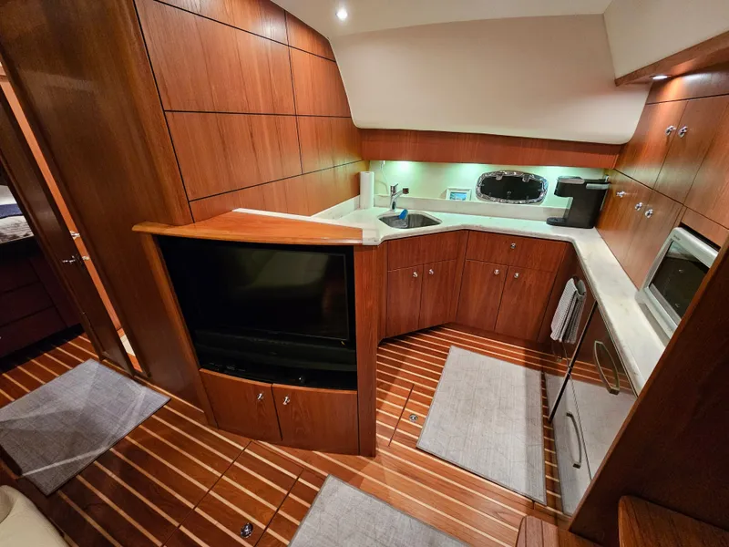 Slide: The Image of Interior of 2014 Tiara Yachts 43 Open with wood finish. - 3