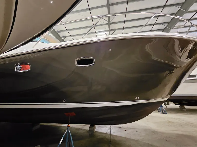 Slide: The Image of 2014 Tiara Yachts 43 Open in a storage facility. - 7