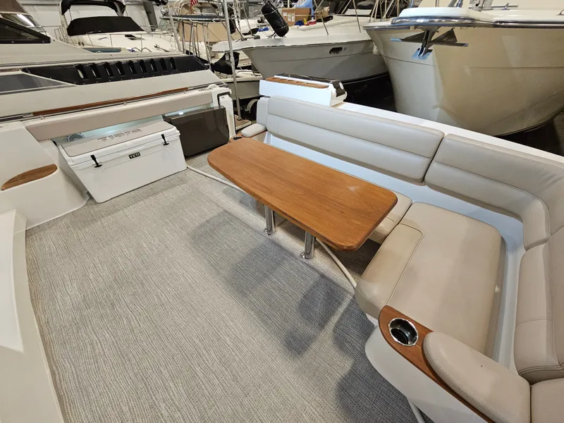 Slide: The Image of Interior of a 2014 Tiara Yachts 43 Open with seating and table. - 9