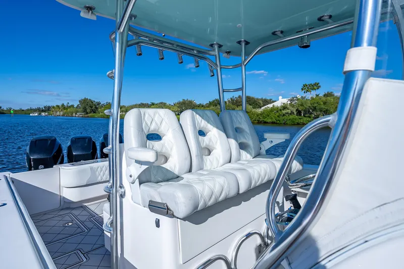 Slide: The Image of 2019 Contender 39 Fisharound boat with luxurious seating on a sunny day. - 14
