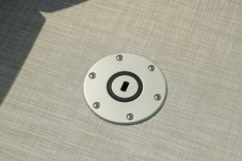 Slide: The Image of Close-up of Dockside 20DQ 2026 model deck fitting on textured surface. - 28