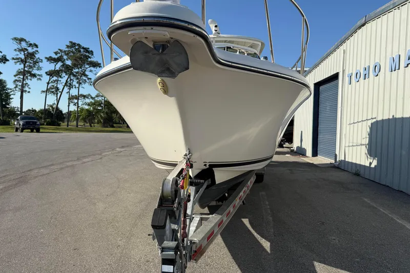 Slide: The Image of 2007 Pursuit OS 335 Offshore boat on trailer outside Toho Marine building. - 7