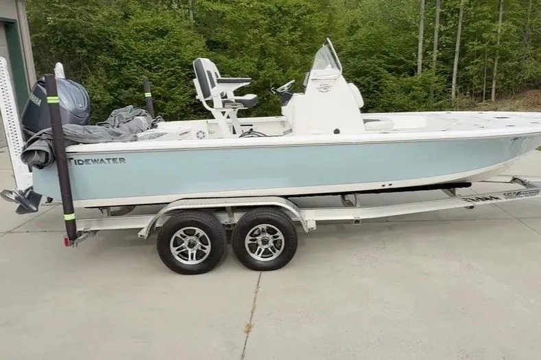 The Image of 2024 Tidewater 2110 Bay Max boat on trailer, parked outdoors. - 0