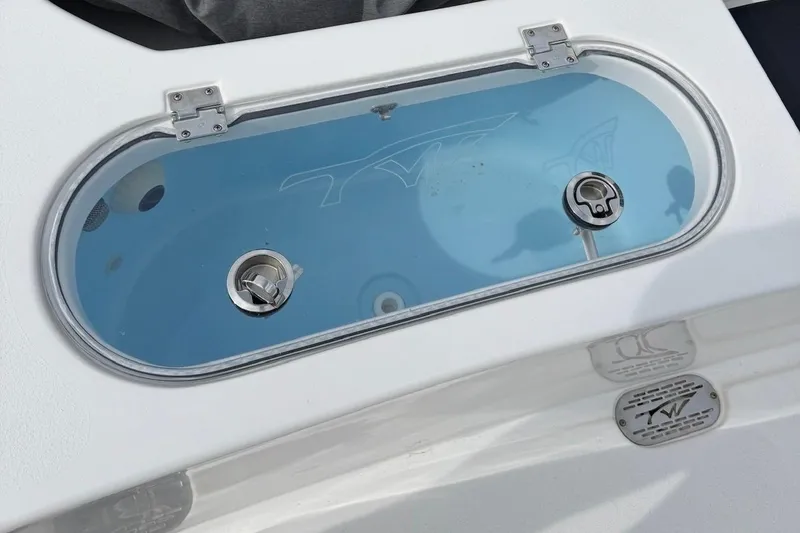 Slide: The Image of Livewell on 2024 Tidewater 2110 Bay Max boat, featuring sleek design and functionality. - 6