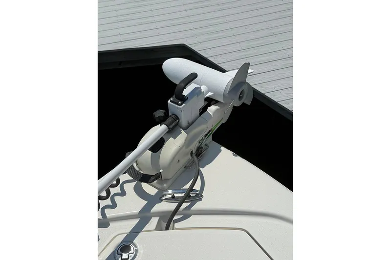 Slide: The Image of 2020 Pathfinder 2500 Hybrid boat with a mounted trolling motor on deck. - 19