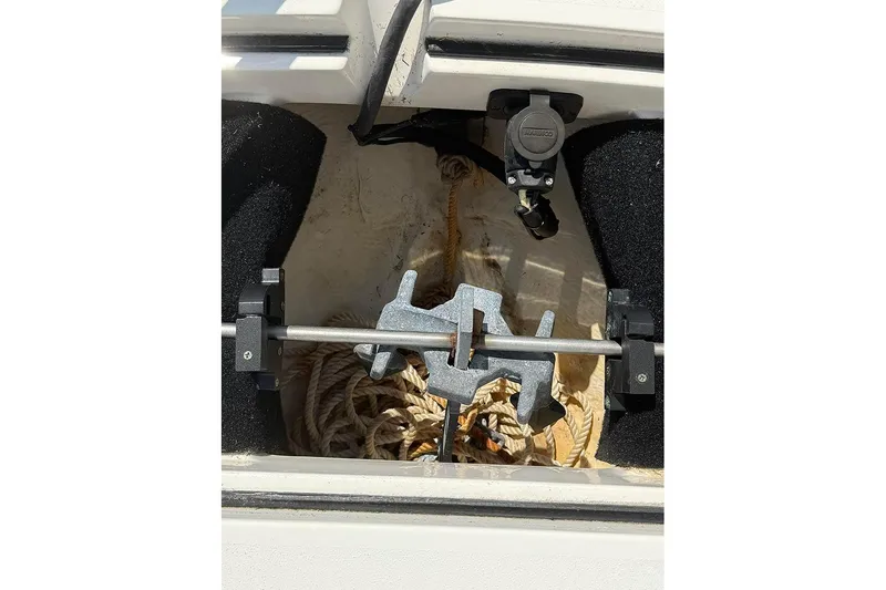 Slide: The Image of Anchor storage compartment in a 2020 Pathfinder 2500 Hybrid boat. - 20