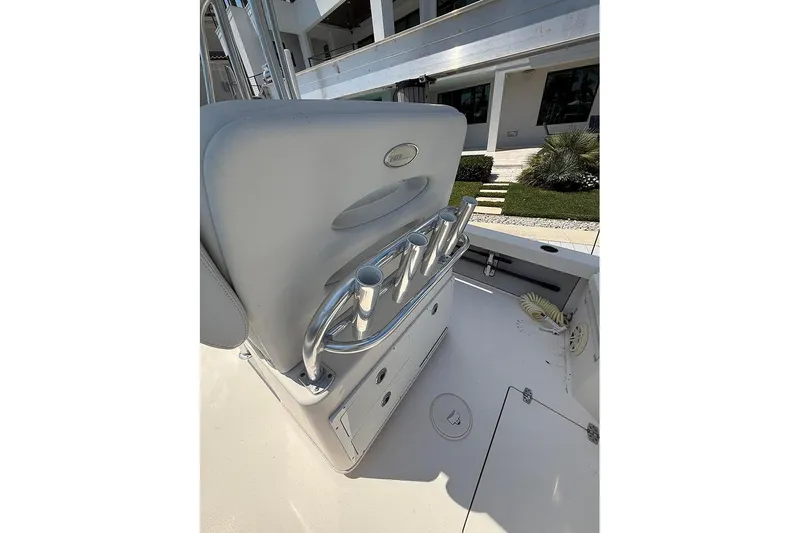 Slide: The Image of 2020 Pathfinder 2500 Hybrid boat interior with rod holders and seating. - 24