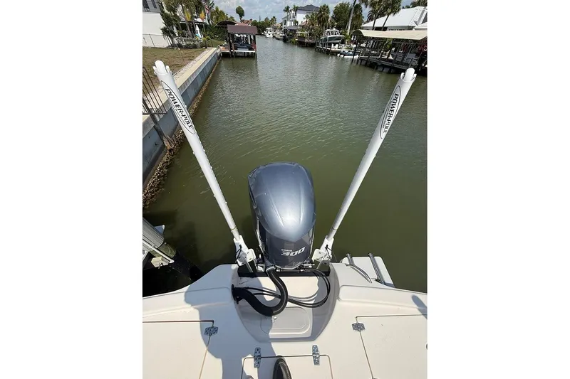 Slide: The Image of 2020 Pathfinder 2500 Hybrid boat with Power-Pole anchors in a canal setting. - 26