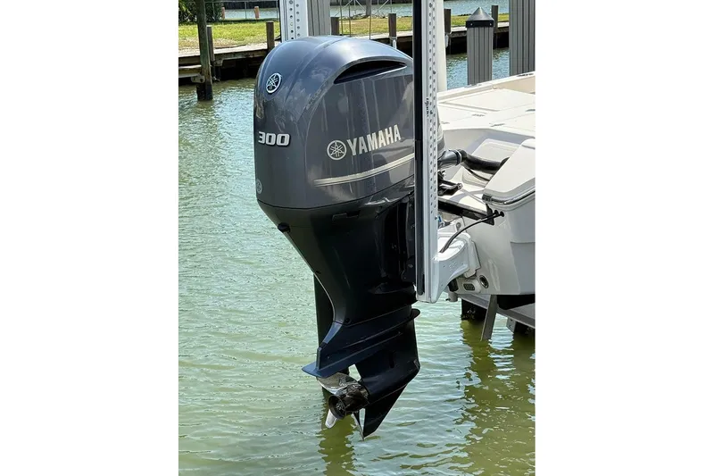 Slide: The Image of Yamaha 300 outboard motor on 2020 Pathfinder 2500 Hybrid boat at dock. - 27