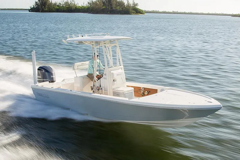 Slide: The Image of Manufacturer Provided Image: 2020 Pathfinder 2500 Hybrid boat cruising on open water. - 30
