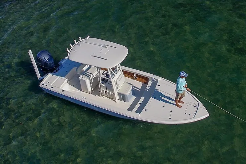Slide: The Image of Manufacturer Provided Image: 2020 Pathfinder 2500 Hybrid boat on clear water with a person fishing. - 31