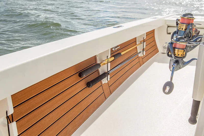 Slide: The Image of Manufacturer Provided Image: 2020 Pathfinder 2500 Hybrid boat with fishing rod holders on deck. - 37