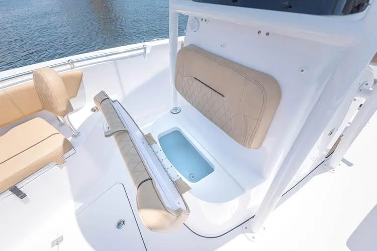Slide: The Image of Manufacturer Provided Image: 2019 Sportsman Open 232 Center Console boat interior with seating and storage. - 24