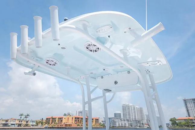 Slide: The Image of Manufacturer Provided Image: 2019 Sportsman Open 232 Center Console boat with rod holders and speakers. - 26