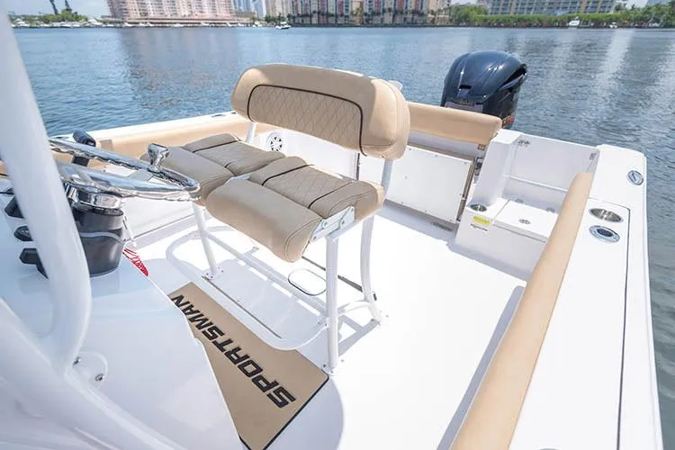 Slide: The Image of Manufacturer Provided Image: 2019 Sportsman Open 232 Center Console boat interior with seating and steering wheel. - 29