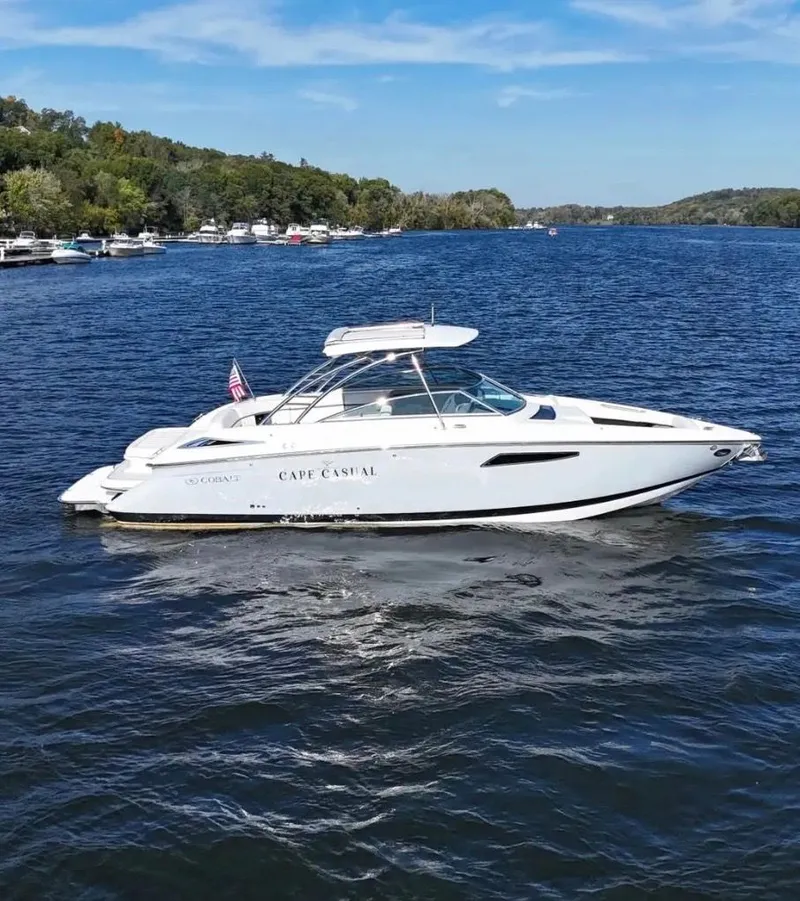 The Image of Cobalt R35 2020 boat on a calm lake under sunny skies. - 0
