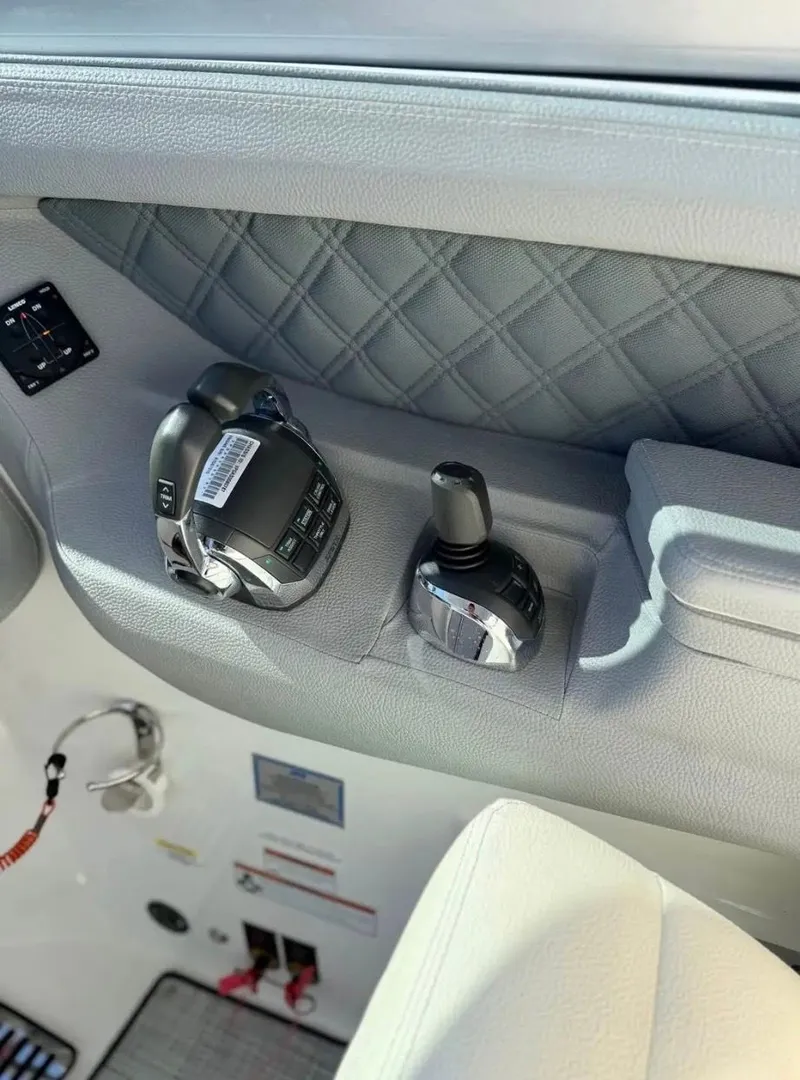 Slide: The Image of Interior of a 2020 Cobalt R35 with throttle and joystick controls. - 10