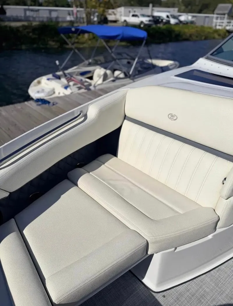 Slide: The Image of Luxurious seating area on a 2020 Cobalt R35 boat. - 13