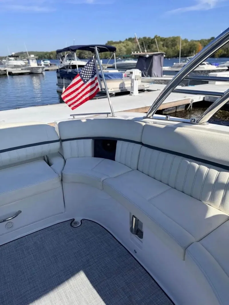Slide: The Image of Cobalt R35 2020 boat with American flag in marina. - 15
