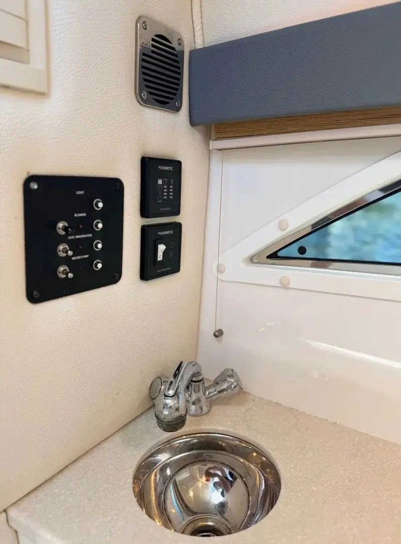 Slide: The Image of Interior of a 2020 Cobalt R35 with sink and control panels. - 21