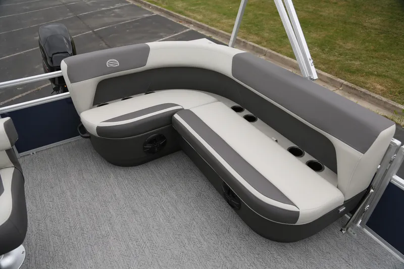 Slide: The Image of 2026 Sun Tracker Bass Buggy 16 XL Select pontoon boat with comfortable seating and cup holders. - 6