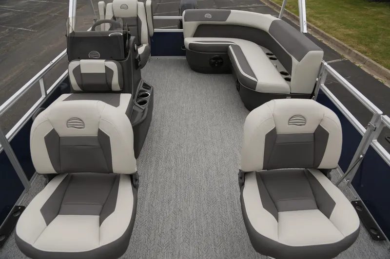 Slide: The Image of 2026 Sun Tracker Bass Buggy 16 XL Select pontoon boat interior with plush seating. - 3