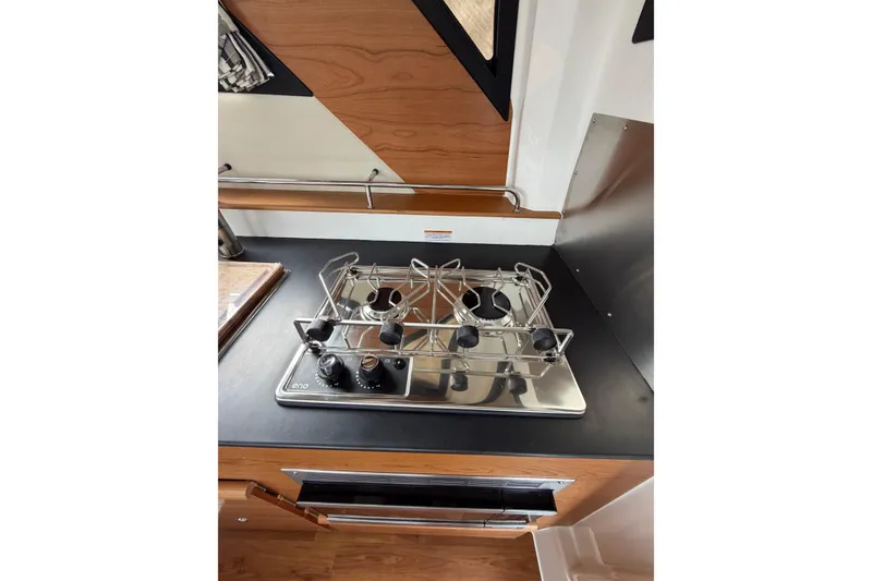 Slide: The Image of Modern kitchen stove in 2026 Cutwater C-288 CB boat interior. - 16