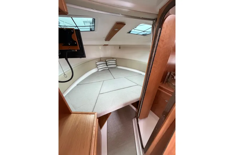 Slide: The Image of 2026 Cutwater C-288 CB cabin interior with cozy bed and modern design. - 21