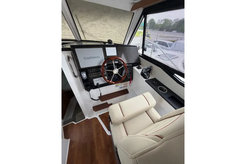 Slide: The Image of Helm of 2026 Cutwater C-288 CB boat with Garmin navigation system. - 9
