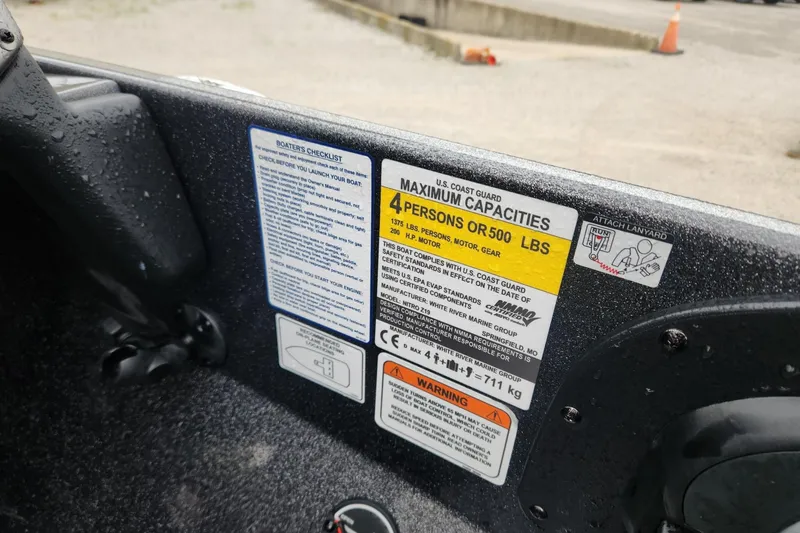 Slide: The Image of Boat capacity and safety labels on a 2022 Nitro Z19 Pro. - 10