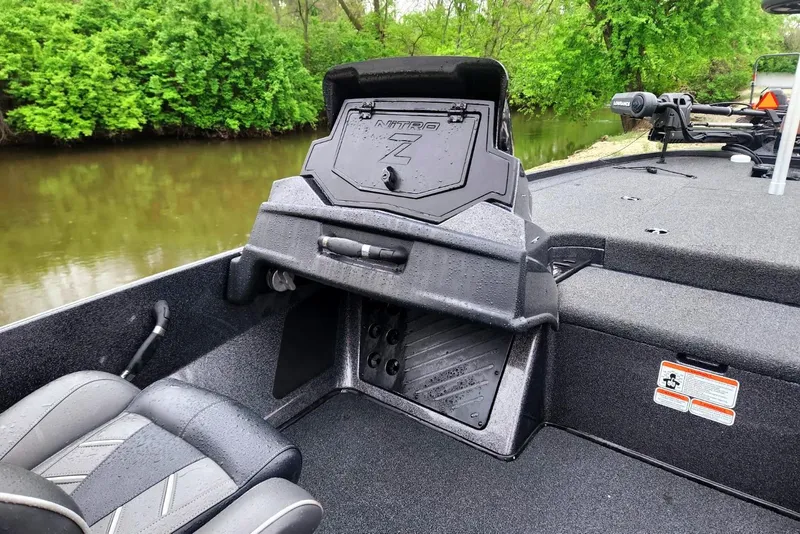 Slide: The Image of 2022 Nitro Z19 Pro boat by riverside with green foliage background. - 9