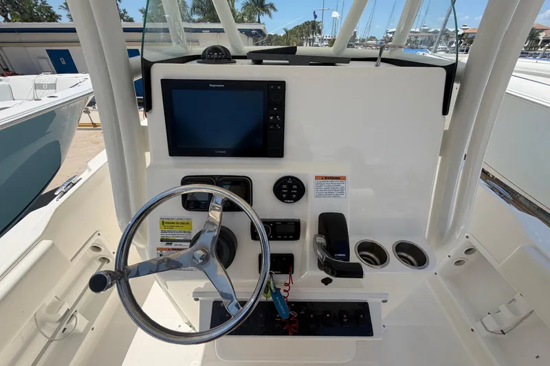 Slide: The Image of Century 2301 Center Console 2016 dashboard with steering wheel and navigation display. - 30