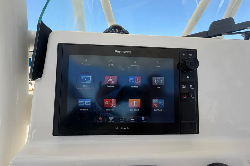 Slide: The Image of Raymarine navigation display on 2016 Century 2301 Center Console boat dashboard. - 32