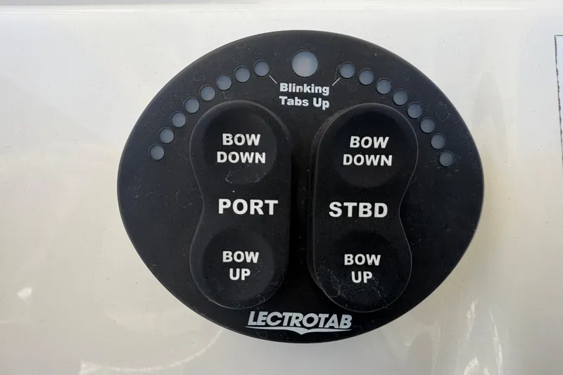 Slide: The Image of Lectrotab trim tab control panel on 2016 Century 2301 Center Console boat. - 34