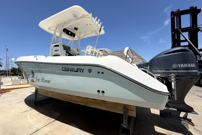 Slide: The Image of 2016 Century 2301 Center Console boat with Yamaha engine on display. - 4