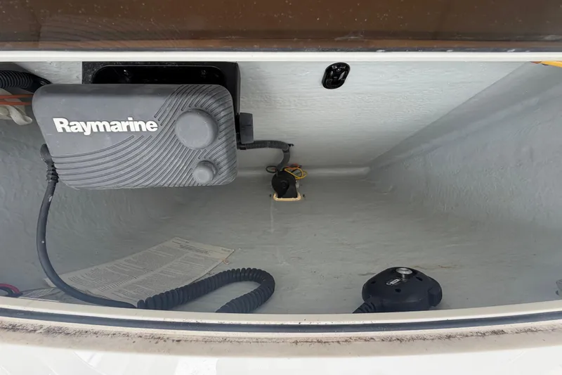 Slide: The Image of Interior view of a 2016 Century 2301 Center Console boat with Raymarine equipment. - 40