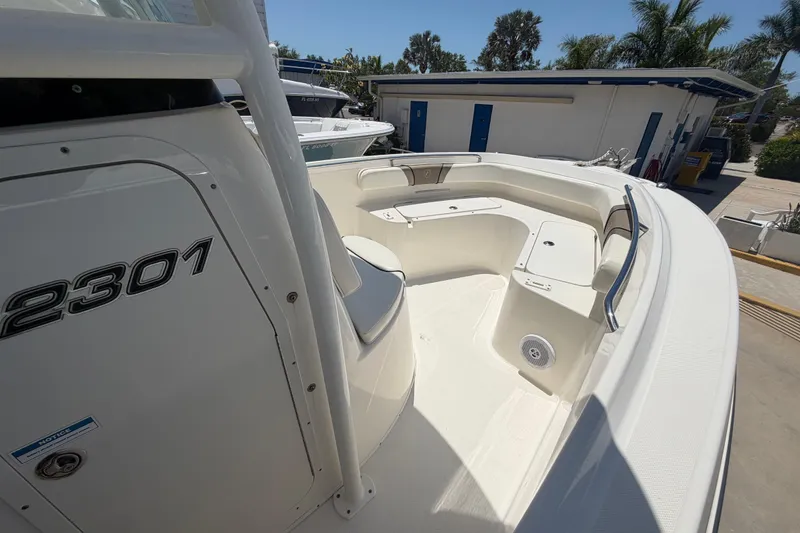 Slide: The Image of 2016 Century 2301 Center Console boat with spacious seating and sleek design. - 46