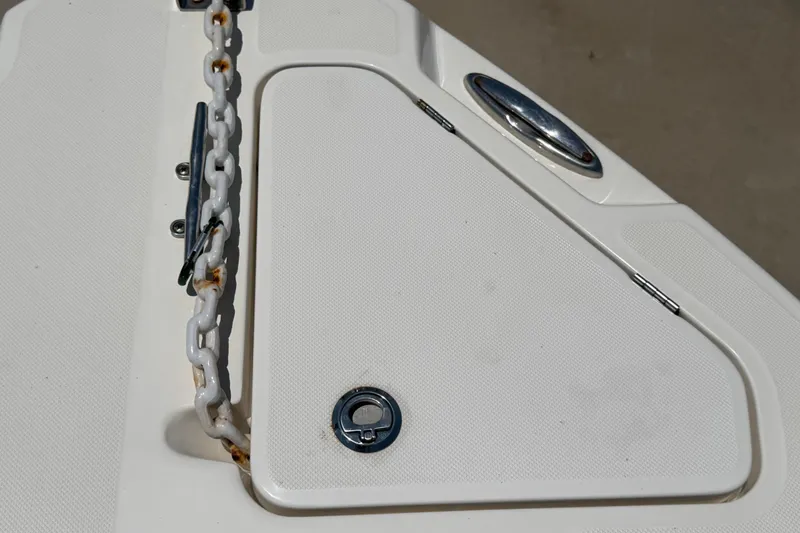 Slide: The Image of 2016 Century 2301 Center Console boat anchor chain and hatch detail. - 50