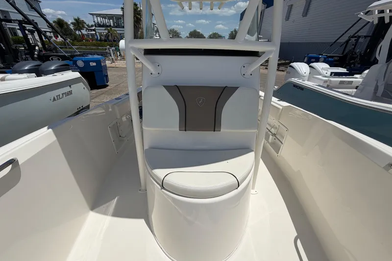 Slide: The Image of 2016 Century 2301 Center Console boat interior with seating and console view. - 59