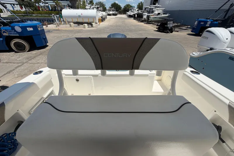 Slide: The Image of 2016 Century 2301 Center Console boat interior with seating and storage area. - 64